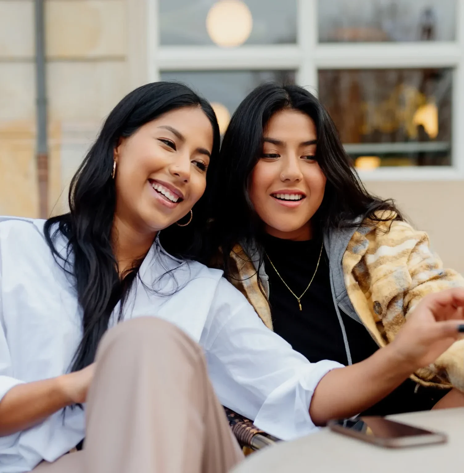 Two smiling patients after dental care