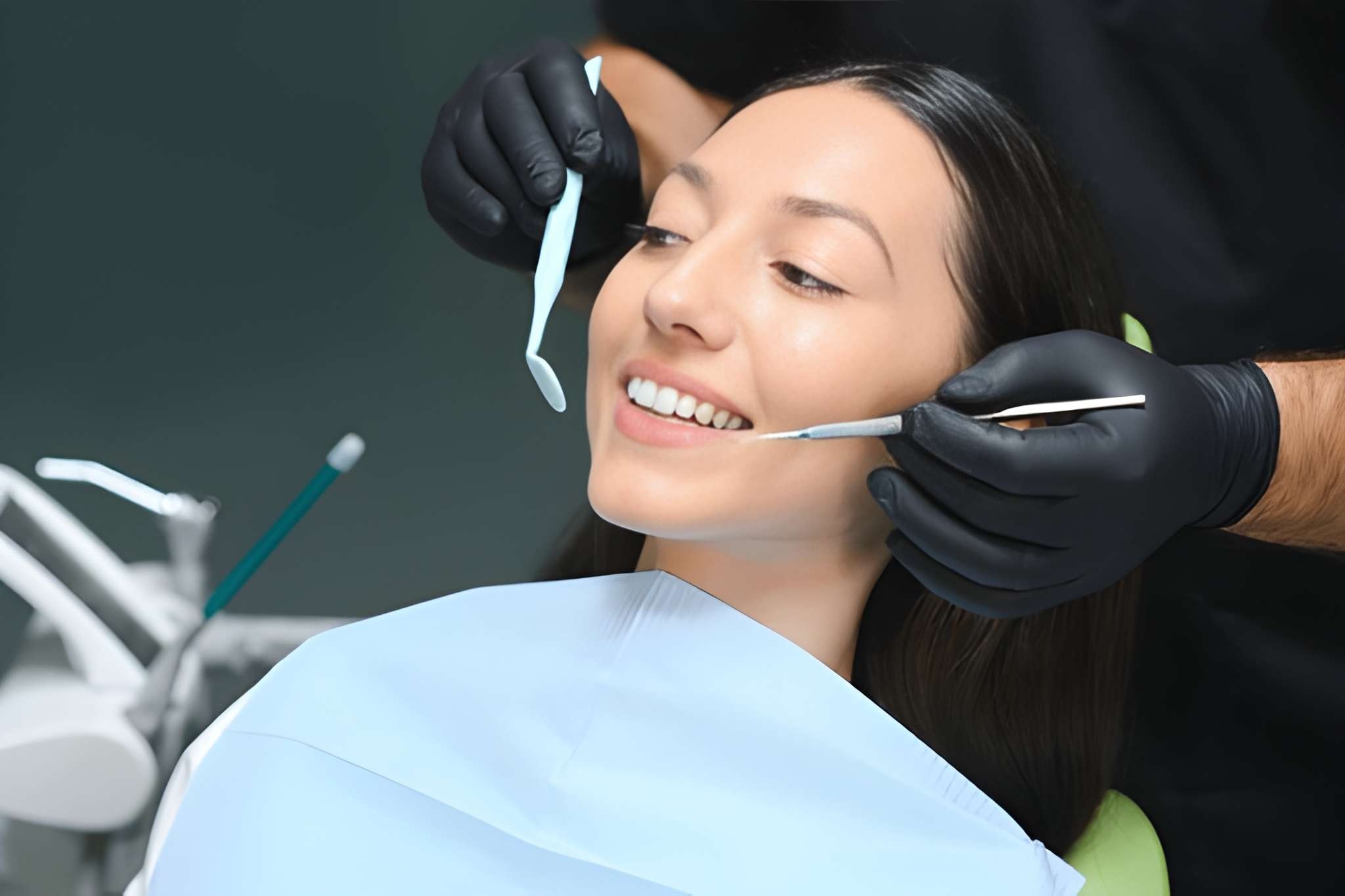 Patient receiving a cosmetic dental examination