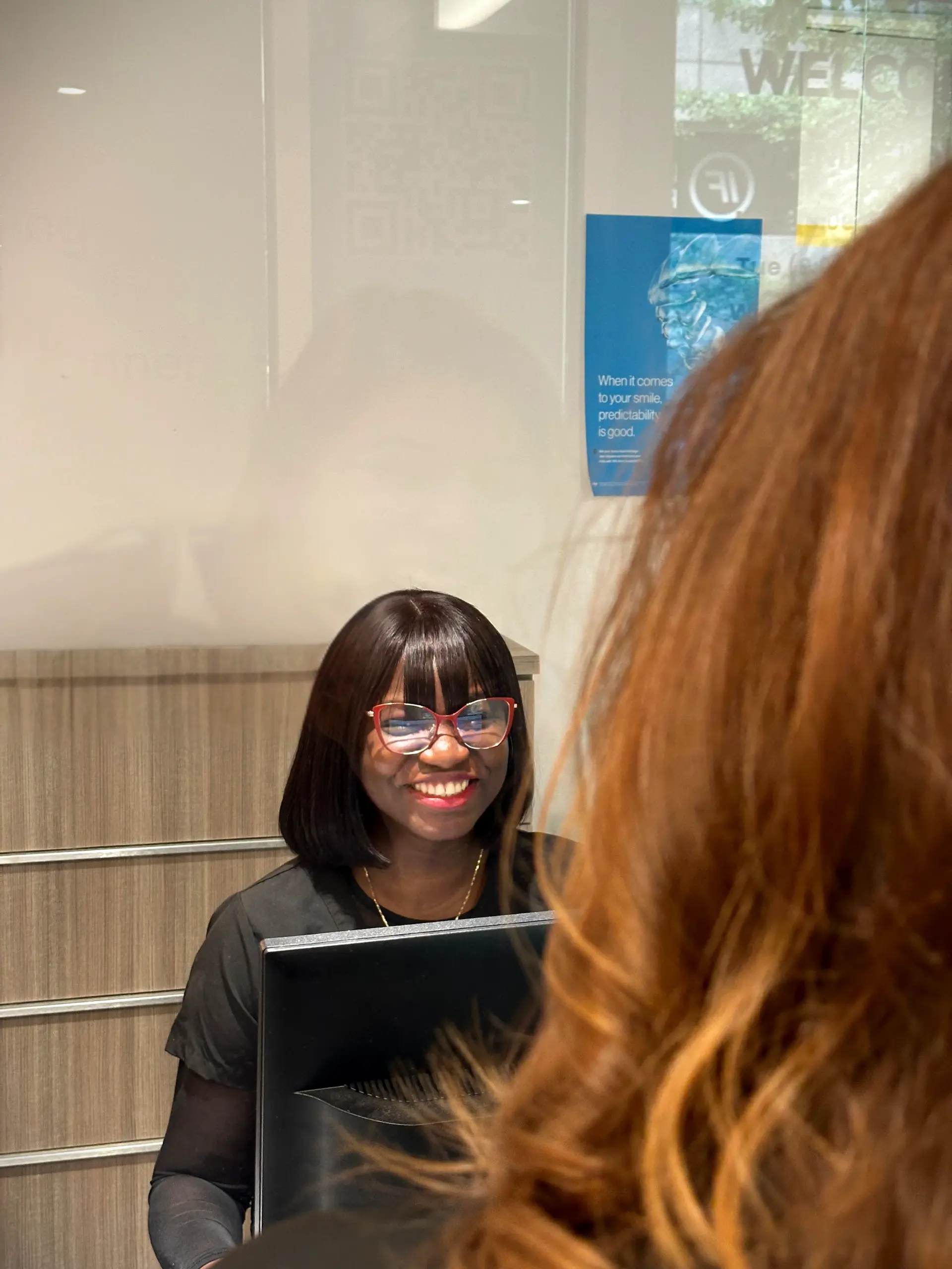 Patient checking in at Hayden Charles Dental Care reception