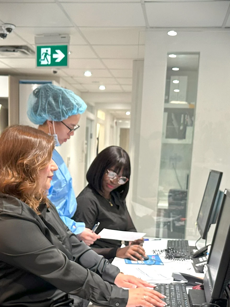 Office manager checking dental insurance information